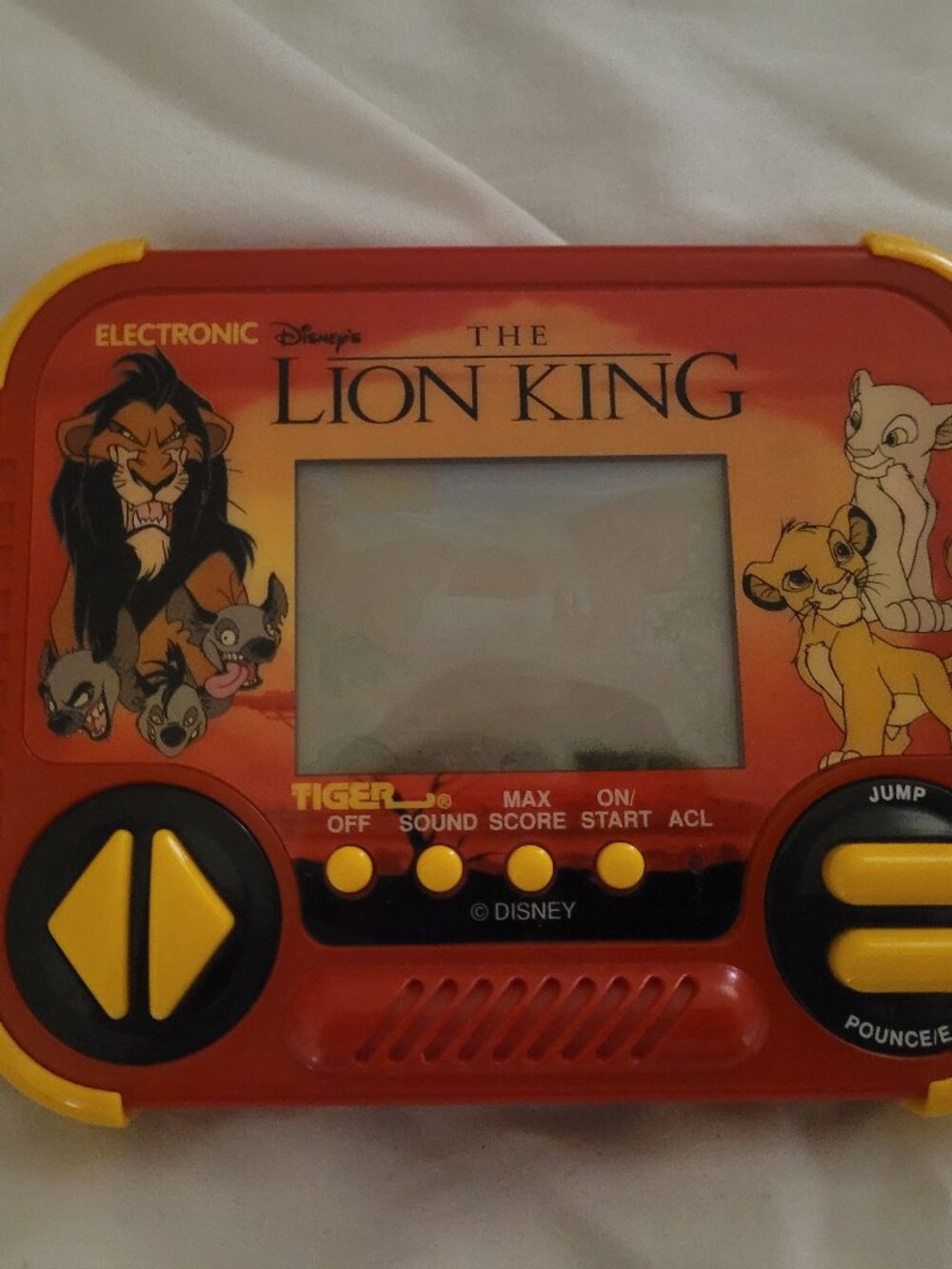 Tiger Electronics Disney The Lion King Handheld LCD Game, vintage 1994 red yello